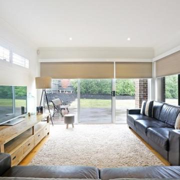 Latte colour Block Out Roller Blinds installed in Lounge room Melbourne Victoria 3000