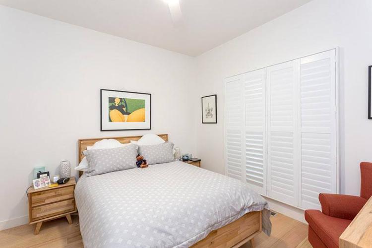 white-plantation-shutters-bedroom-closed