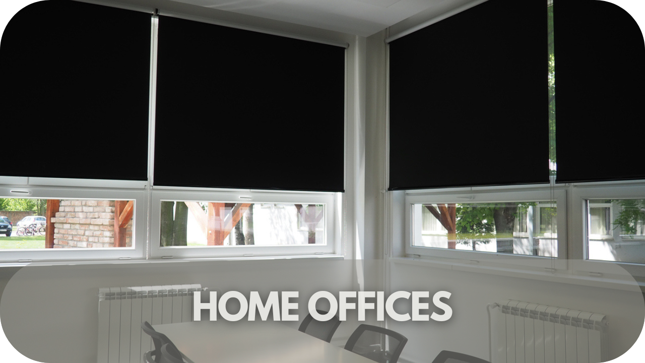 Image of blockout roller blinds in a home office providing privacy and reduced glare.